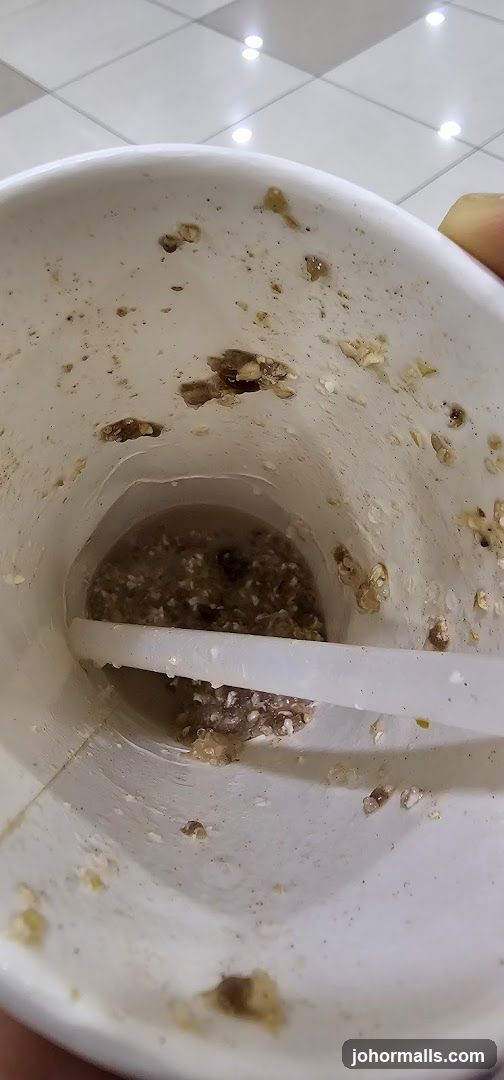 Dirty Cup with Food Remnants
