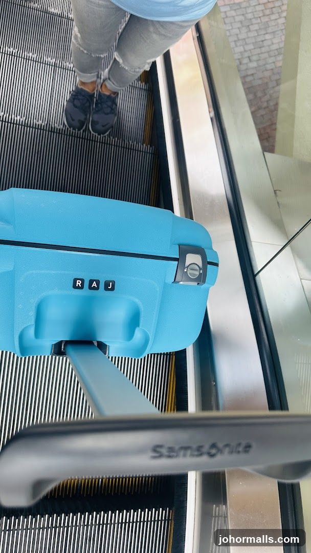 Luggage on Escalator