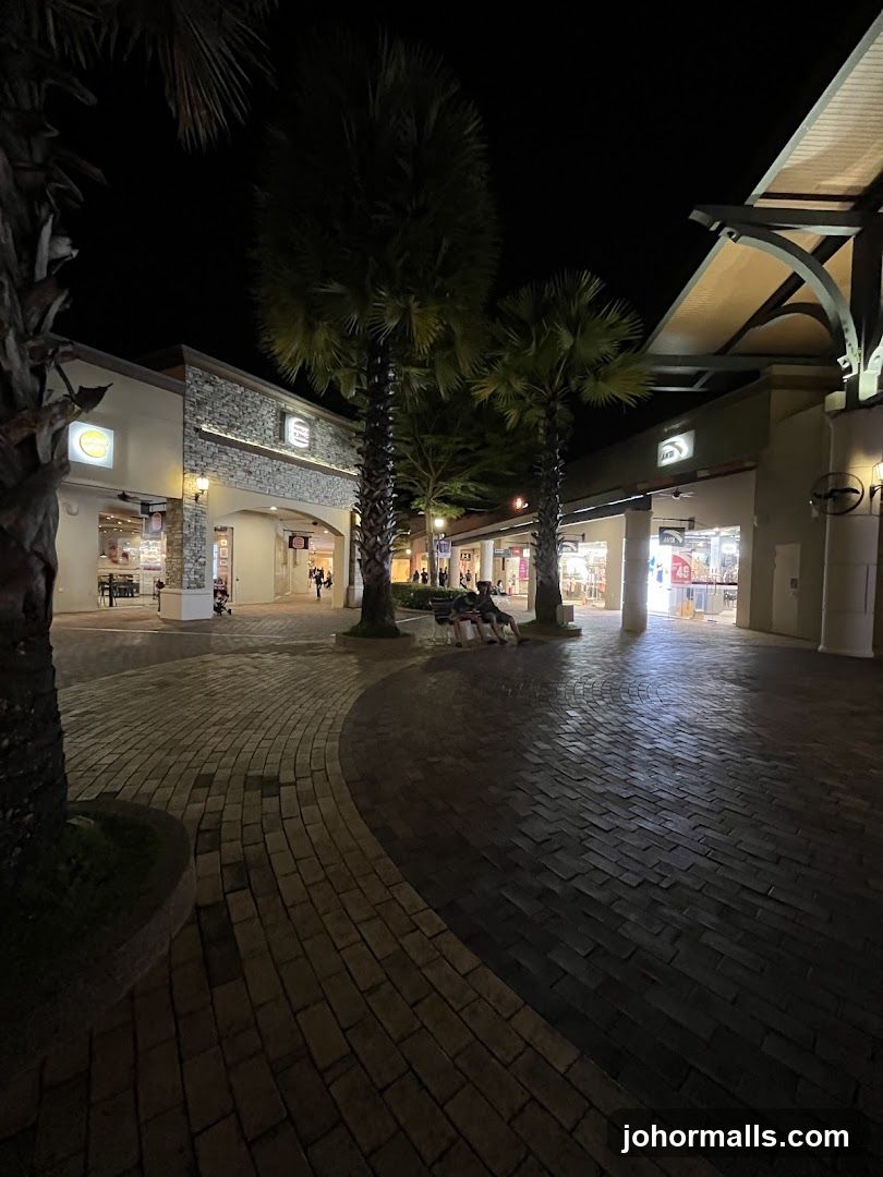 Outdoor shopping area at night
