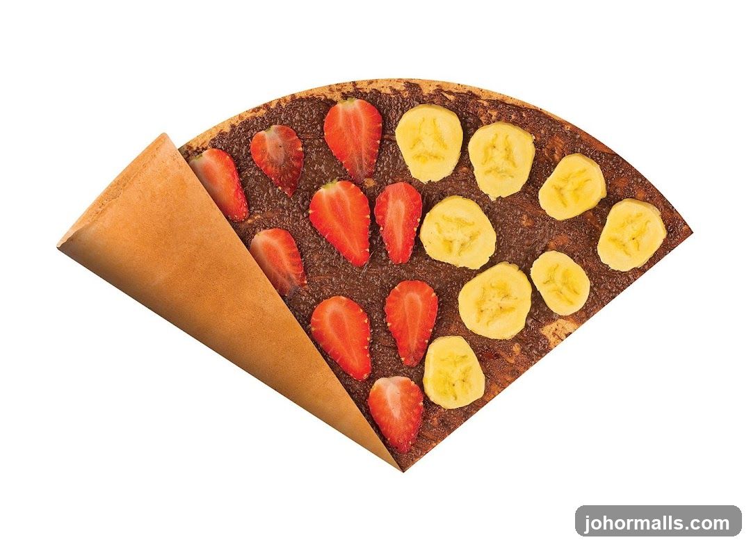 Crepe with Chocolate Spread, Strawberries, and Bananas