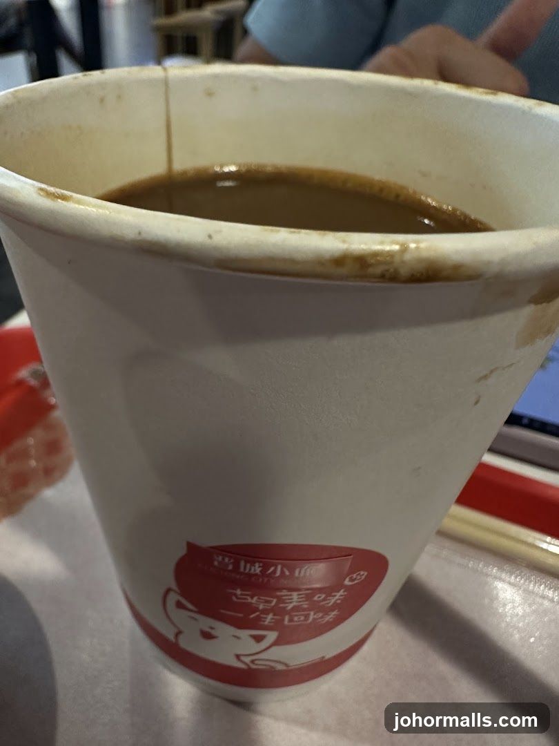 Coffee in a branded cup