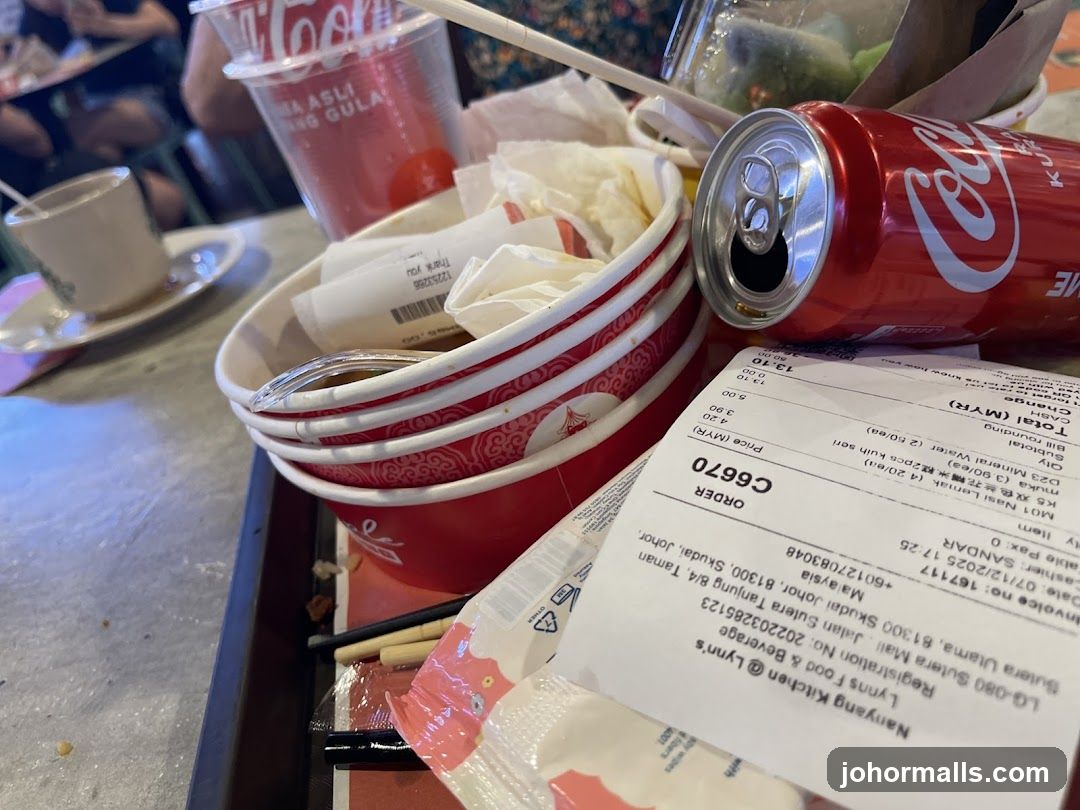 Table with food remnants and receipts