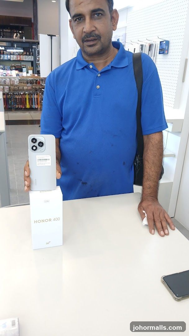 Man holding a new phone