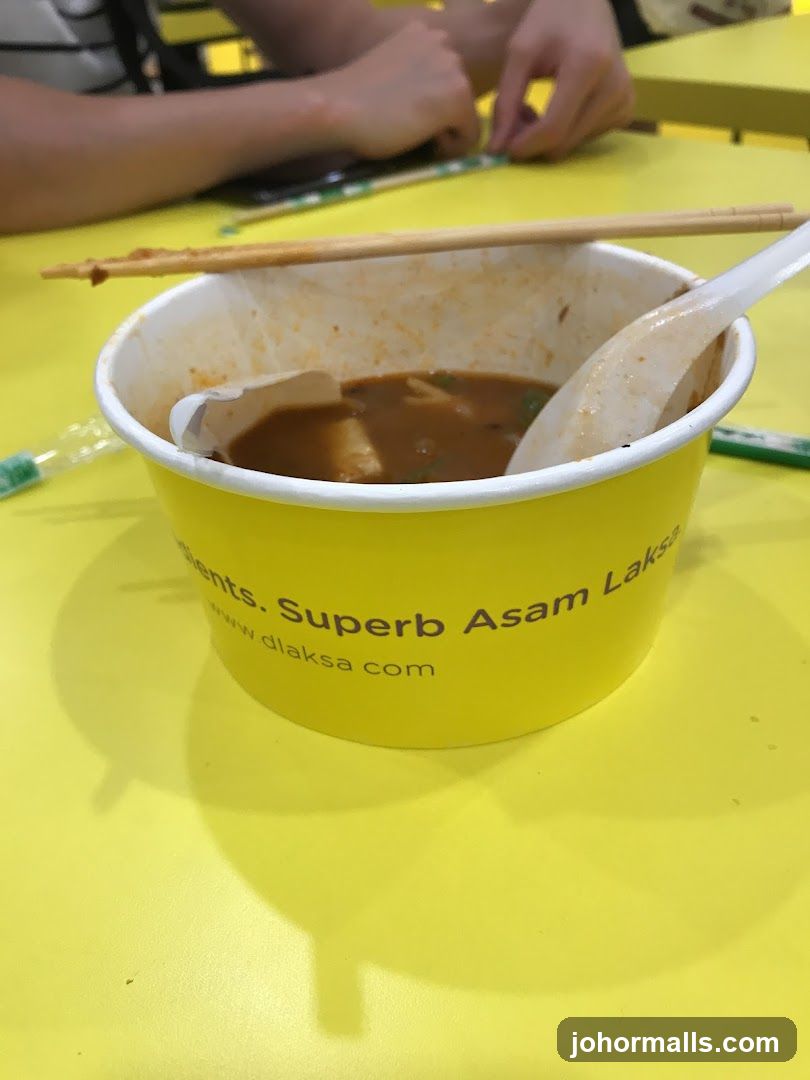 Laksa in a yellow cup