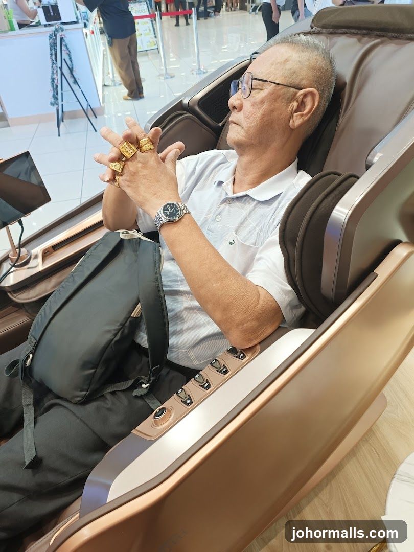 Man trying out a massage chair