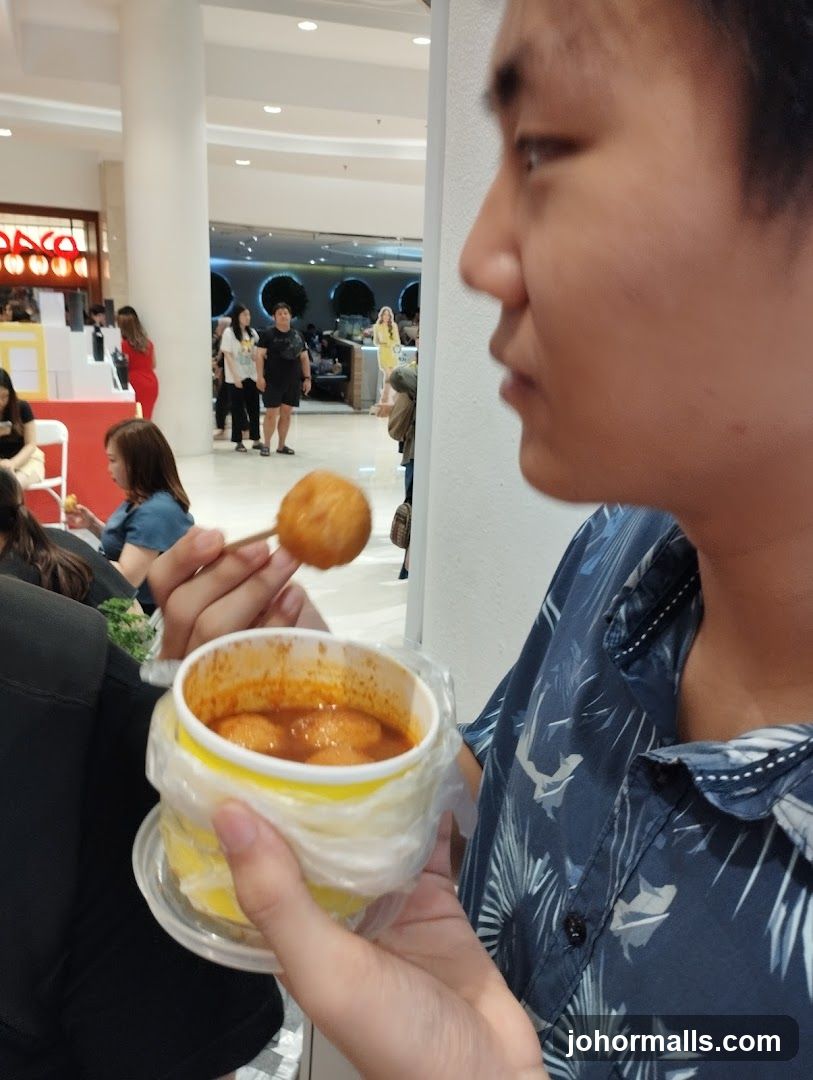 Person eating street food