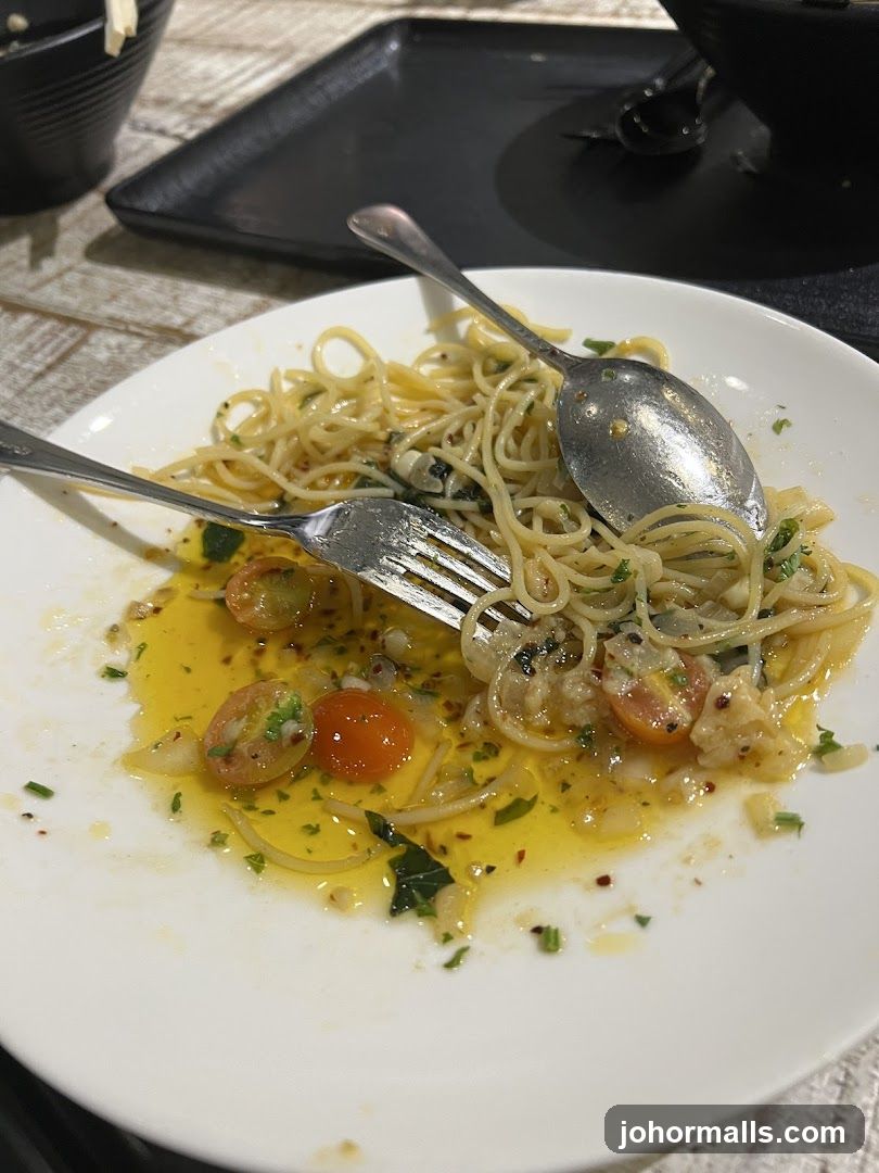 Partially Eaten Pasta Dish