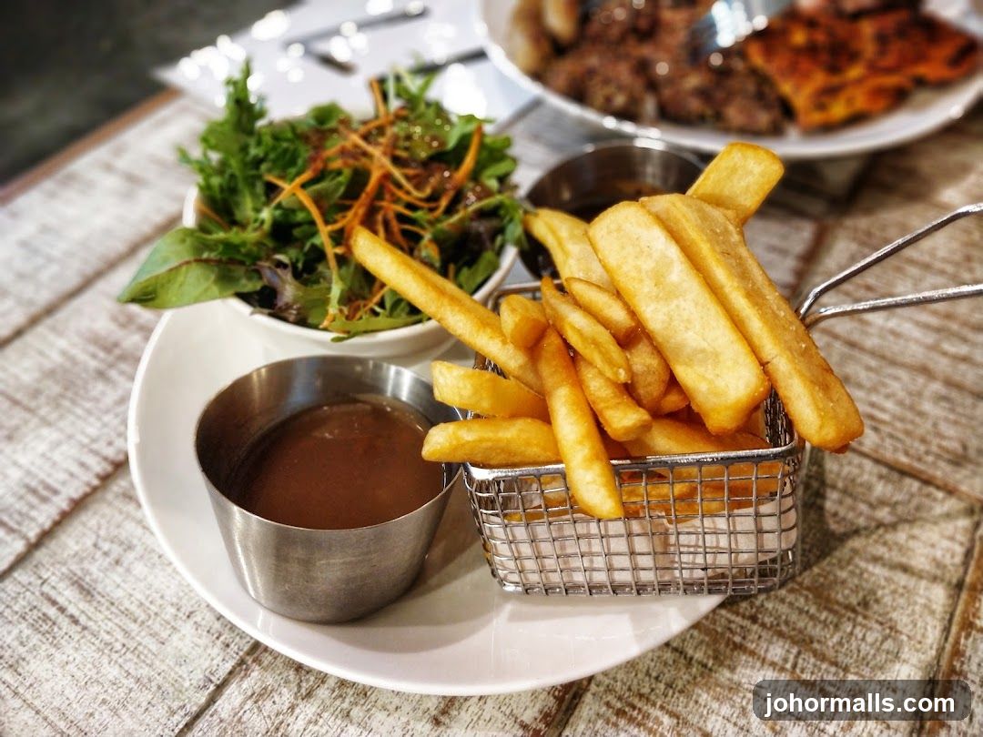 French Fries with Gravy and Salad