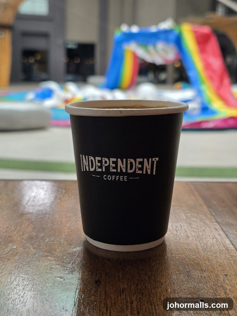 Coffee Cup with "Independent Coffee" Logo