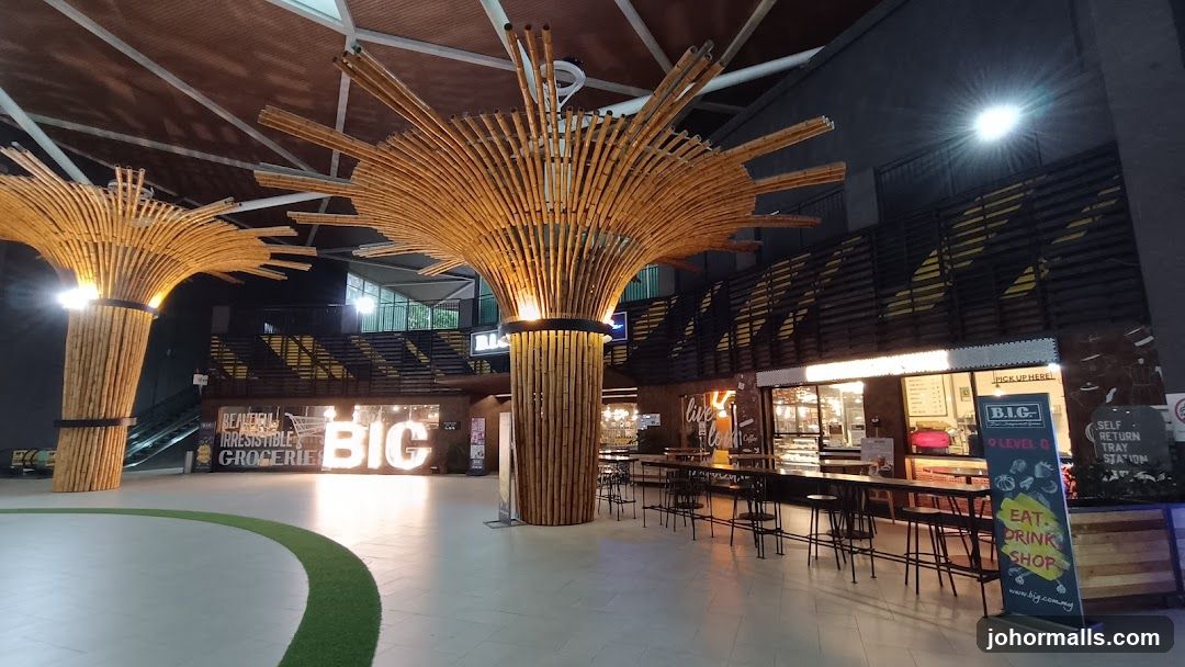 Interior of a large retail space with decorative bamboo structures
