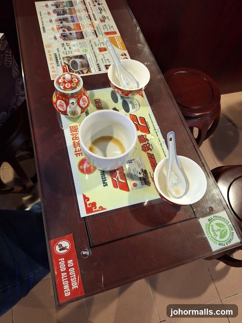 Table Setting with Menu and Teapot