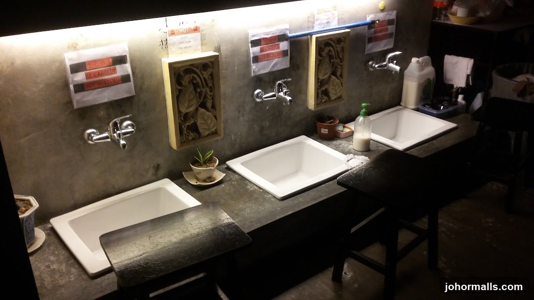 Sink Area with Warning Signs