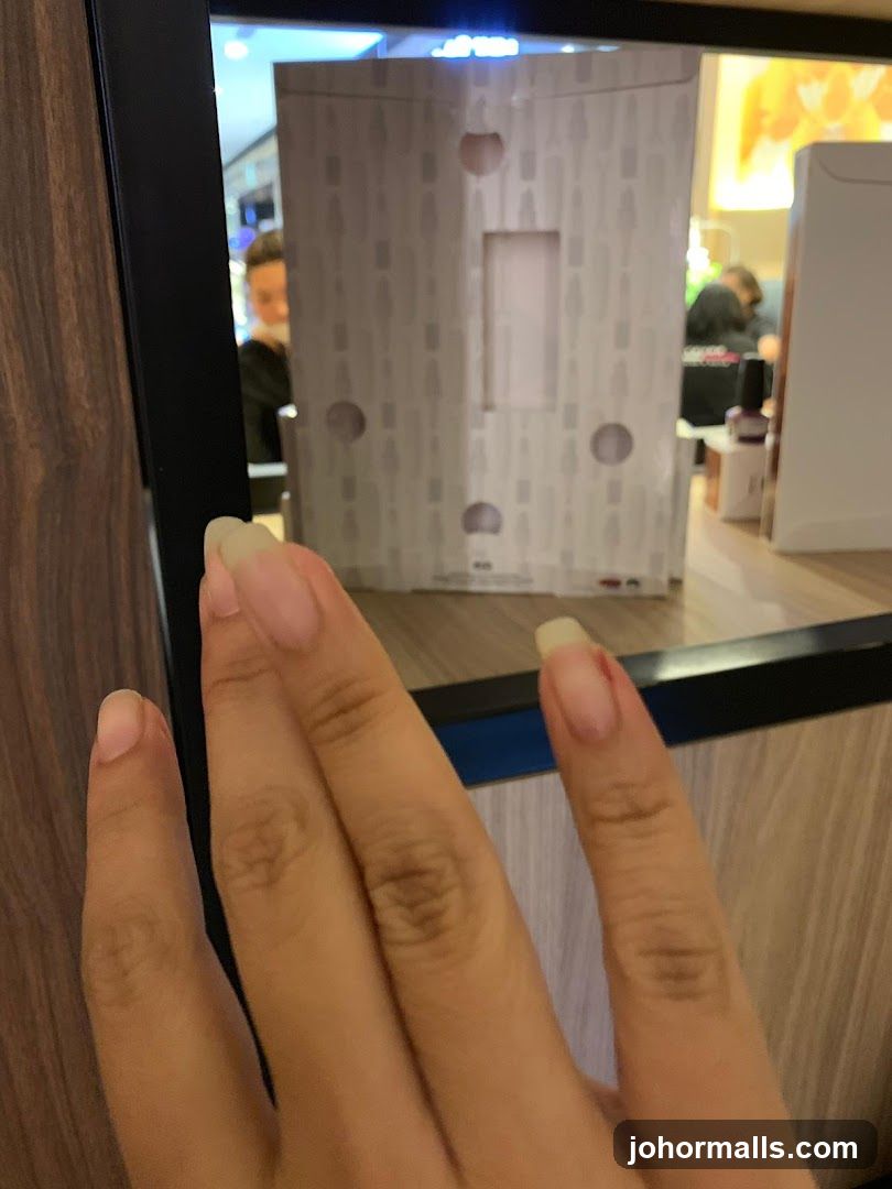 Reflection of a person and product packaging