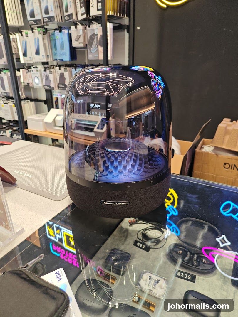 Harman Kardon Speaker and Earbuds Display