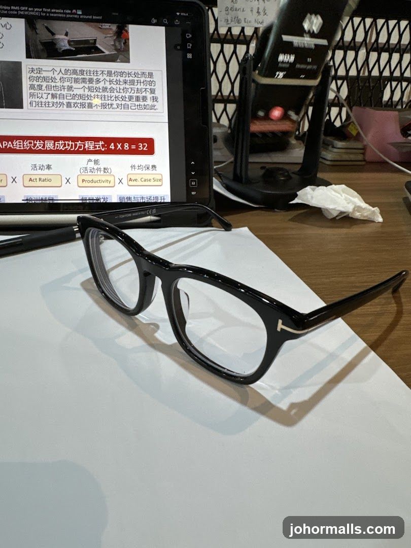 Desk with Glasses and Tablet