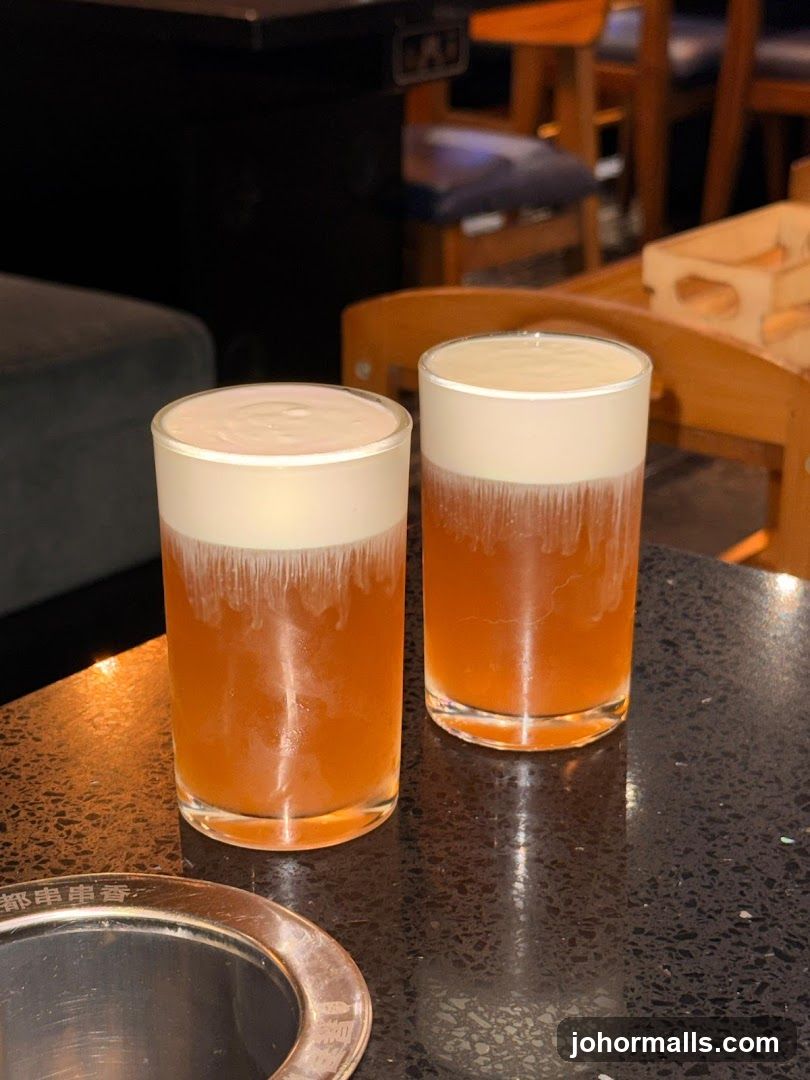 Two drinks with foam