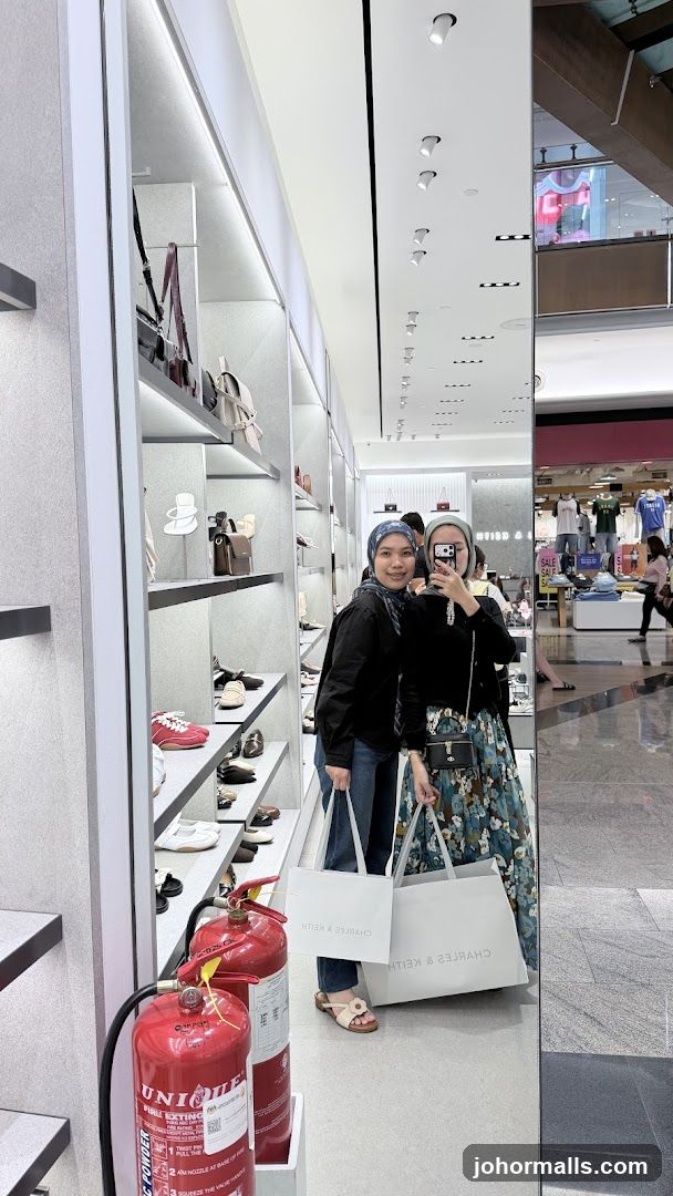 Two Women Posing in a Store