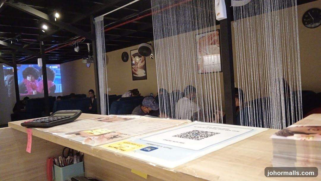 Interior of a lounge with screens and seating