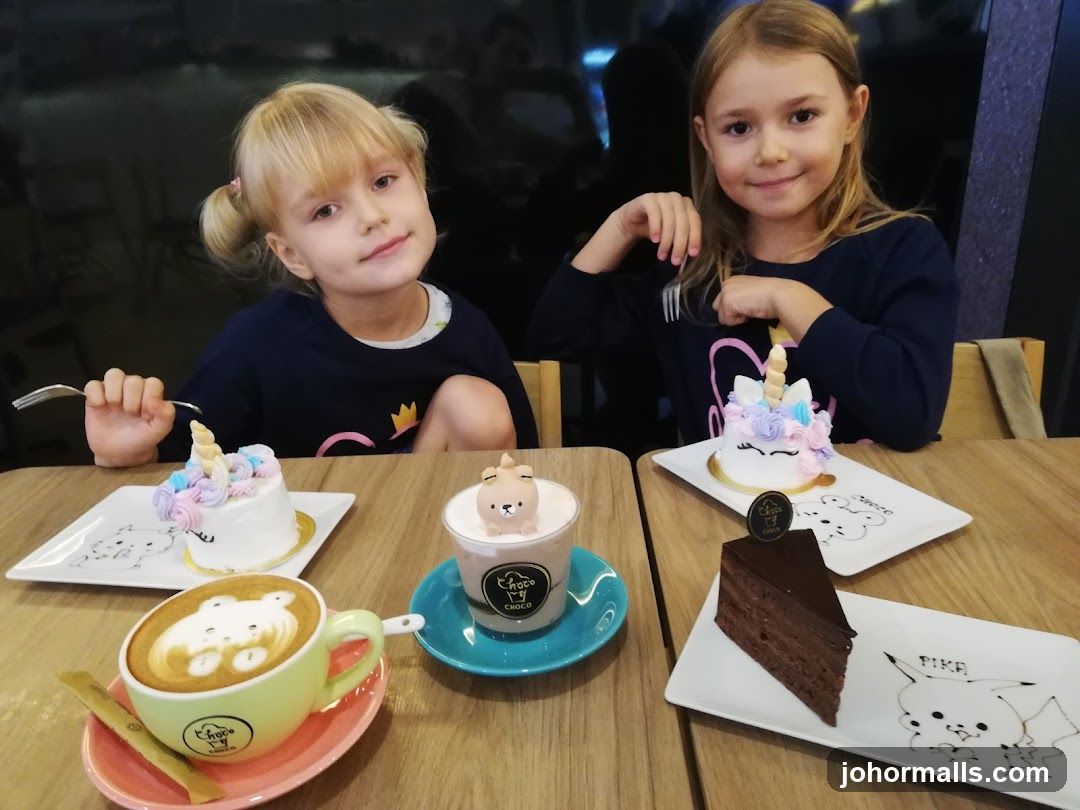 Two girls with desserts