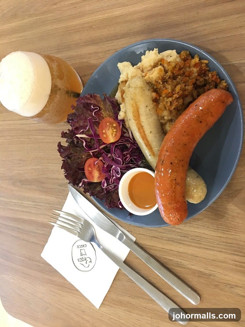 Sausage Platter with Mashed Potatoes and Salad