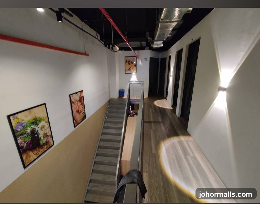Interior hallway with artwork and stairs