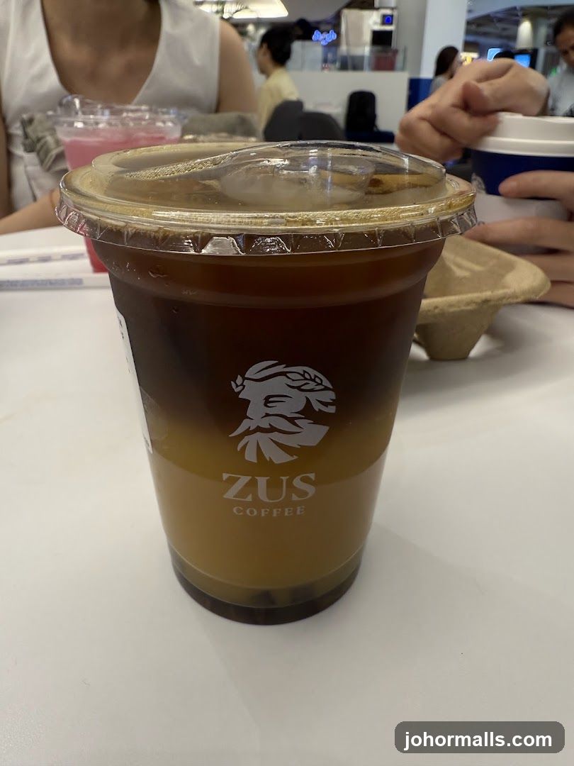 Iced Coffee with ZUS Coffee Logo