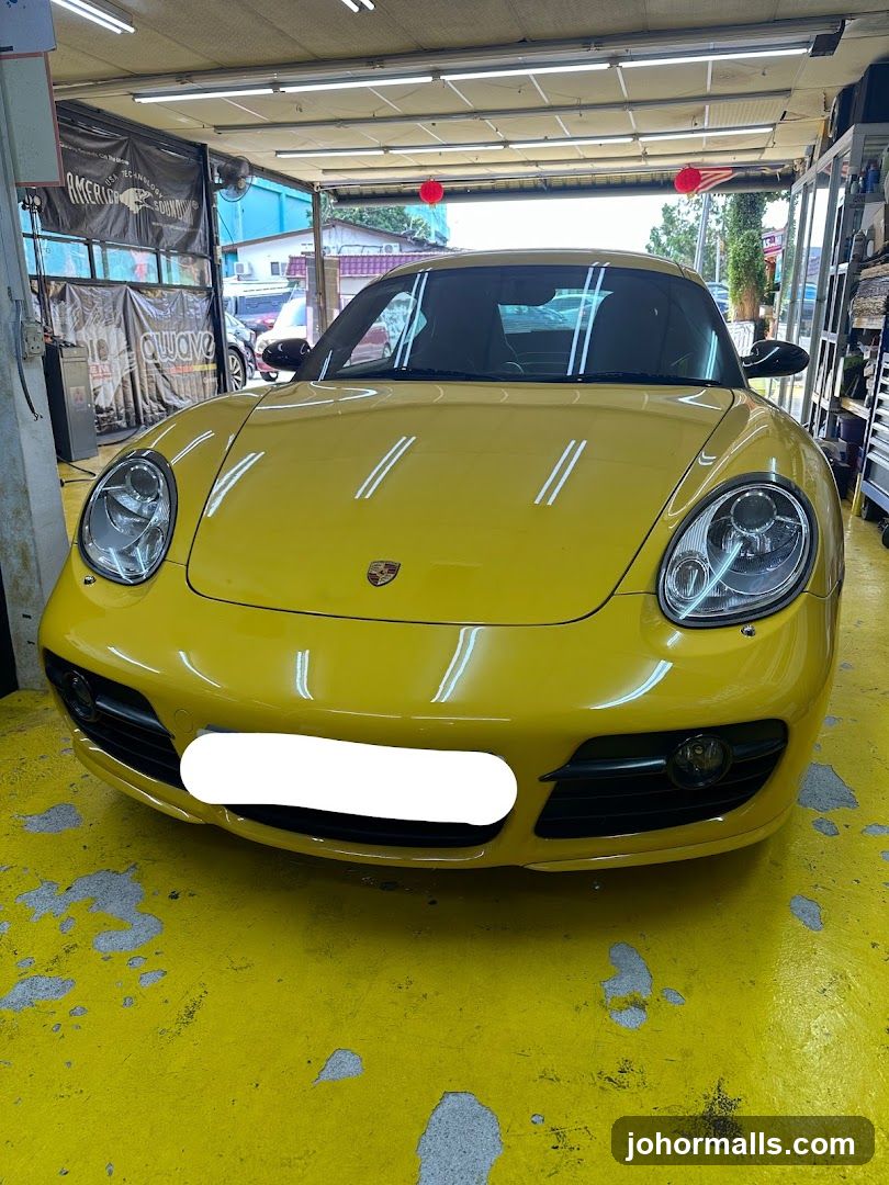 Yellow Porsche in Garage