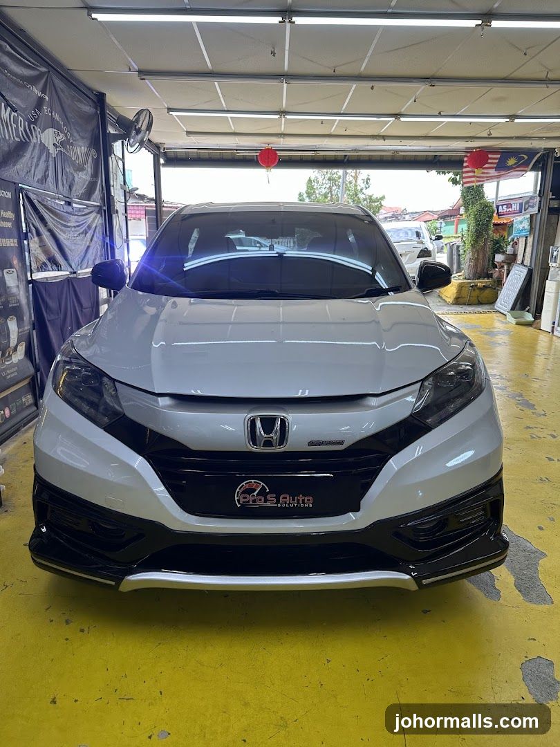 White Car in Auto Shop