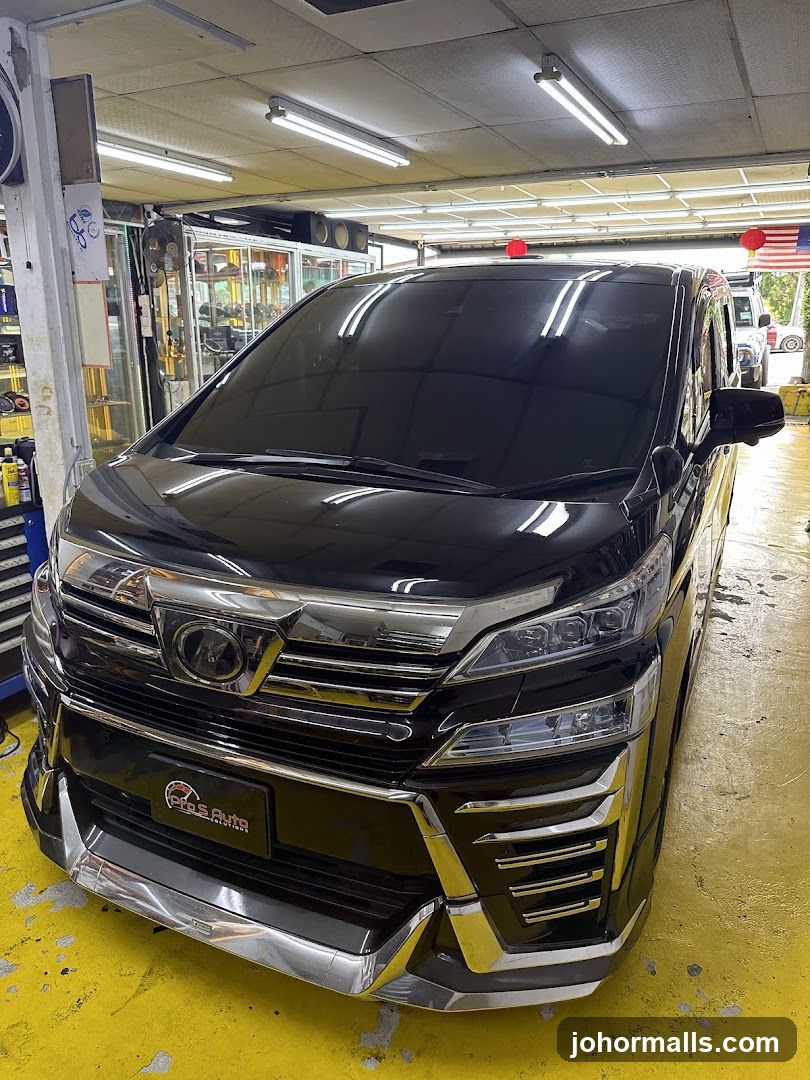Black Car in Auto Shop