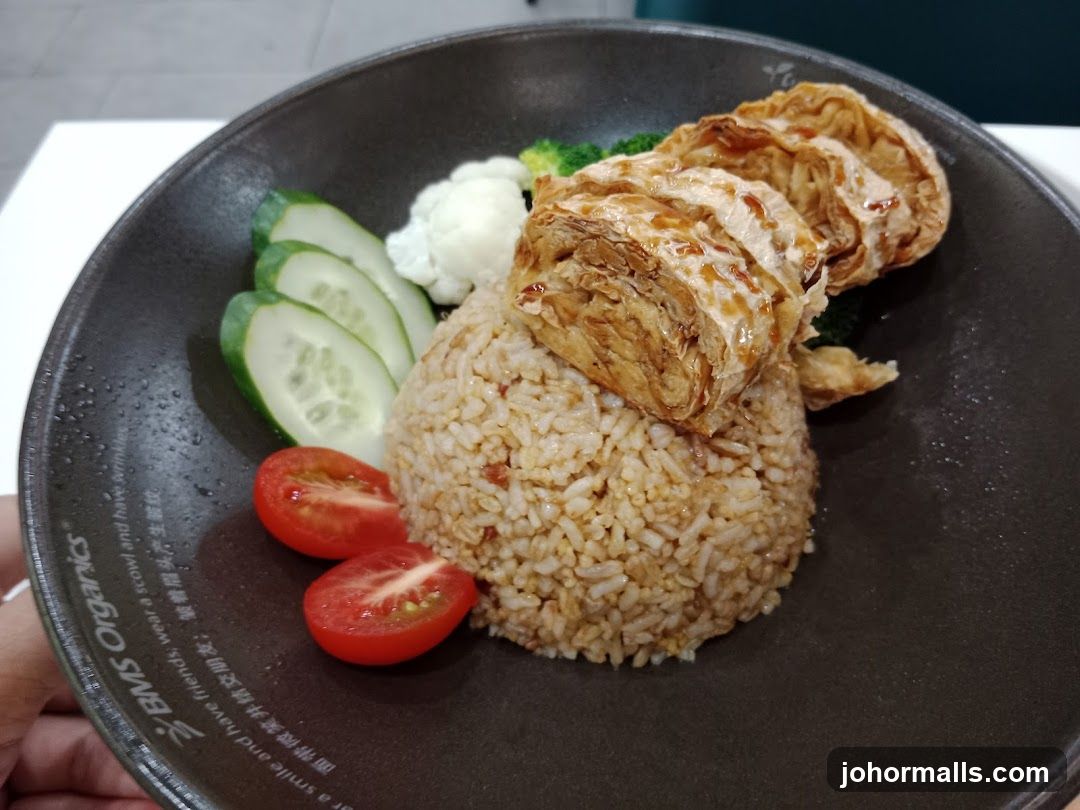 Rice dish with vegetables and fried tofu skin