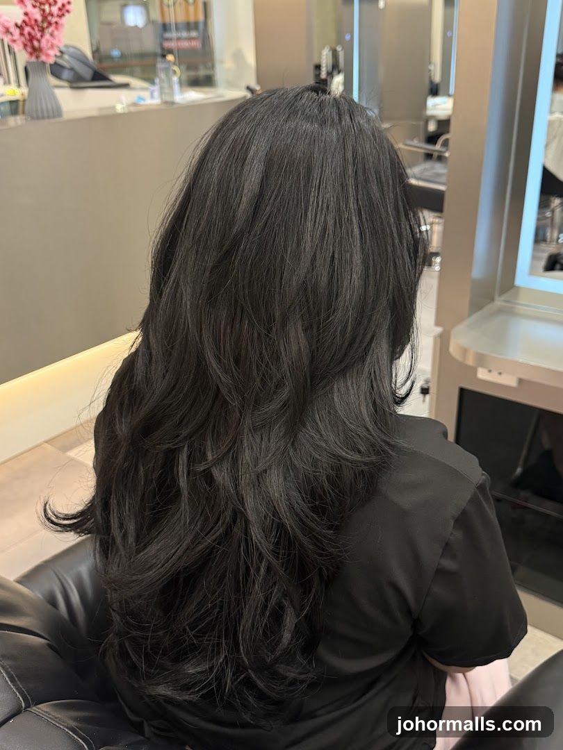 Woman with layered black hair