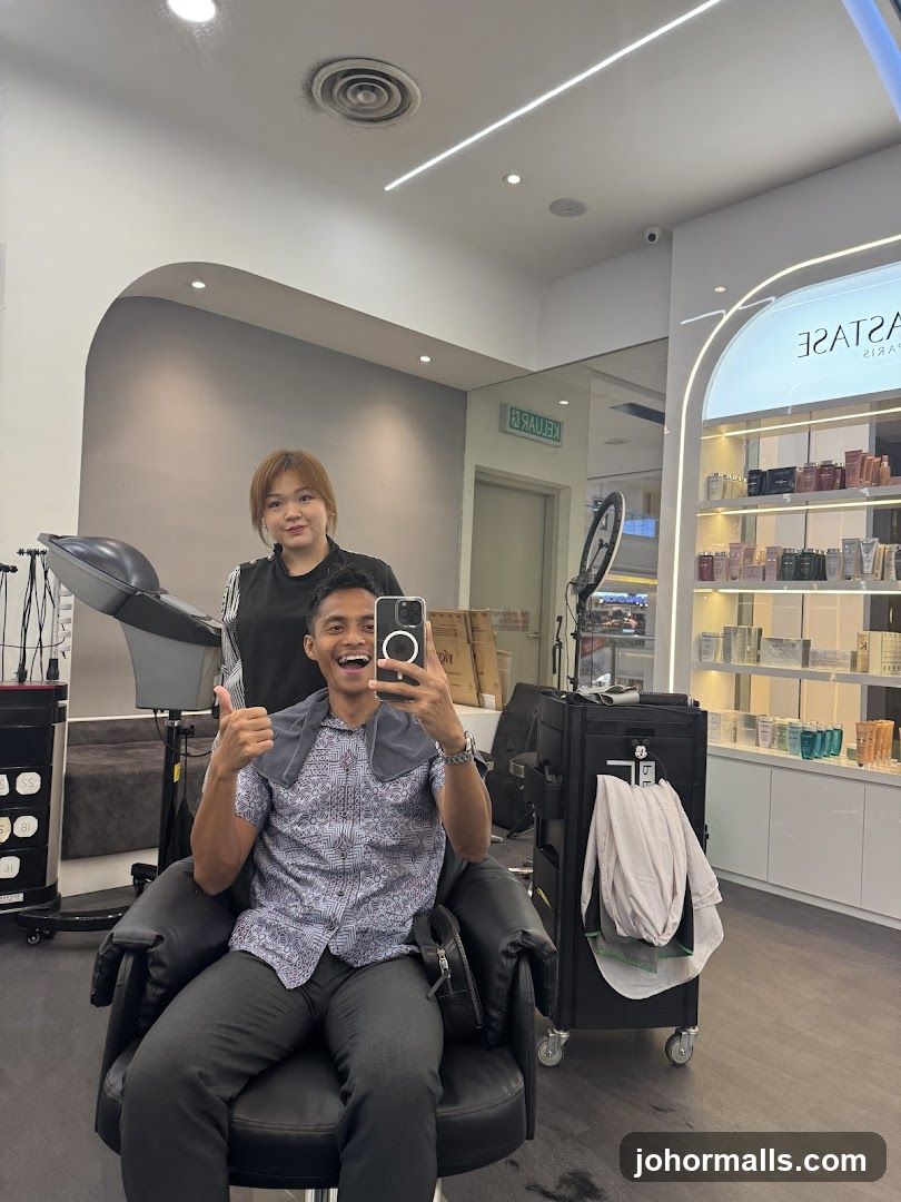 Man and hairdresser in salon