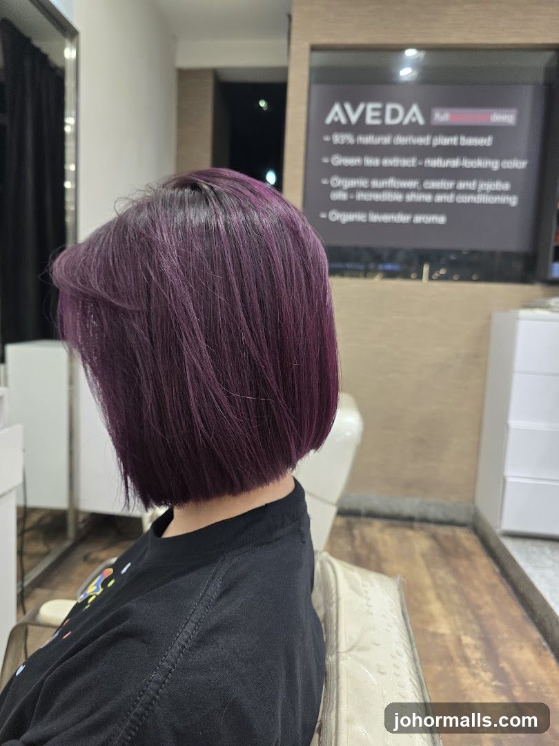 Woman with purple bob haircut
