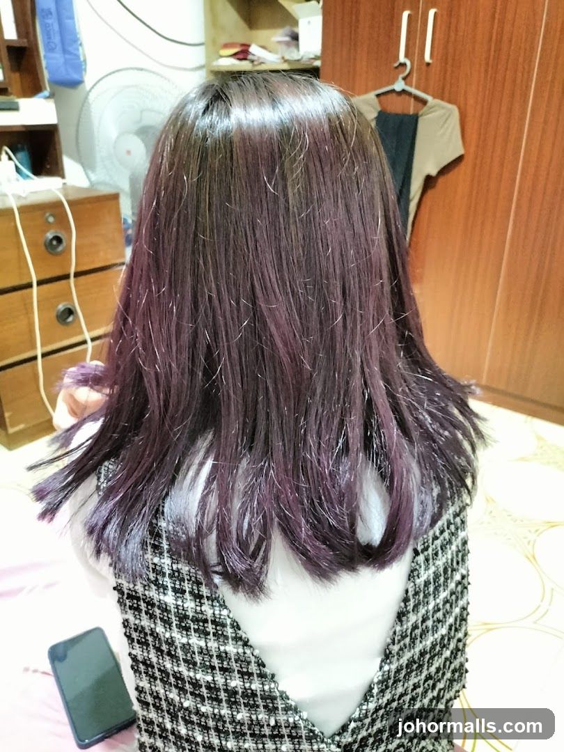 Woman with purple-tinted hair