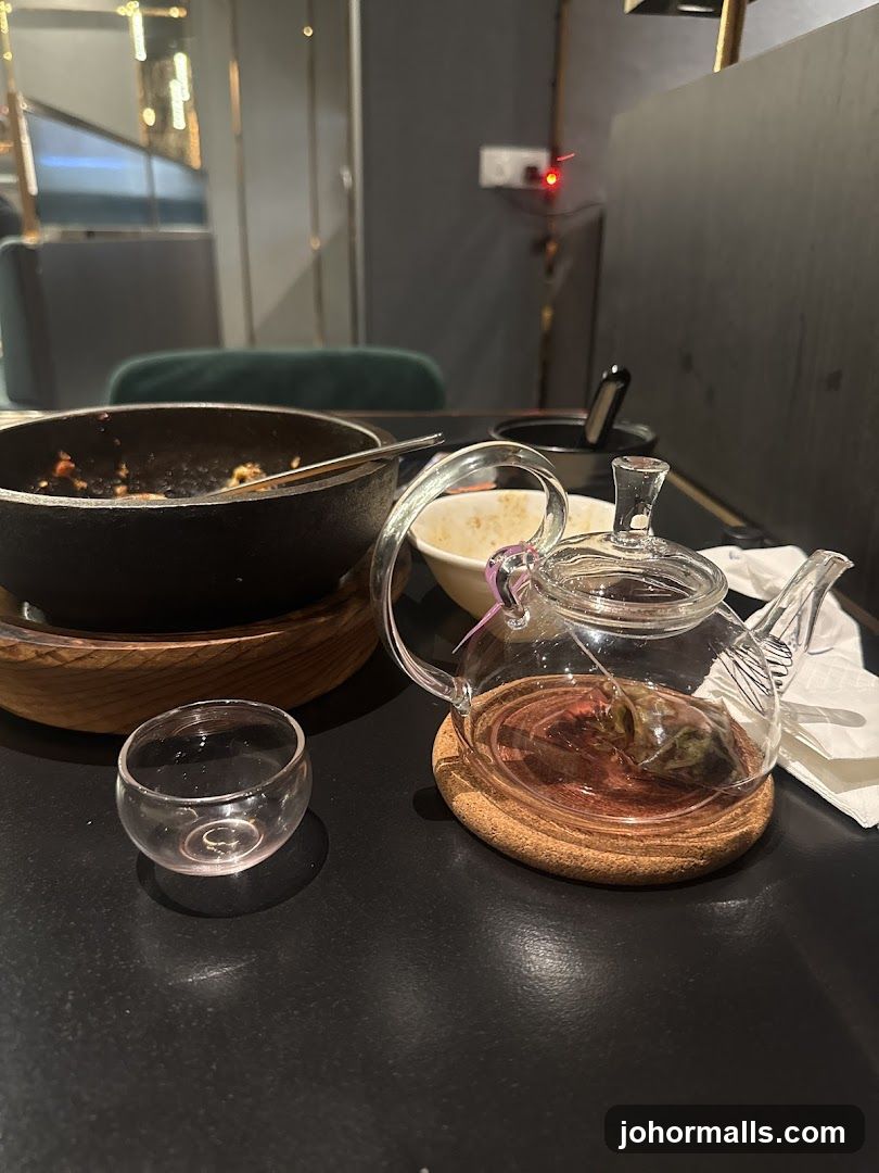 Table setting with teapot and teacup