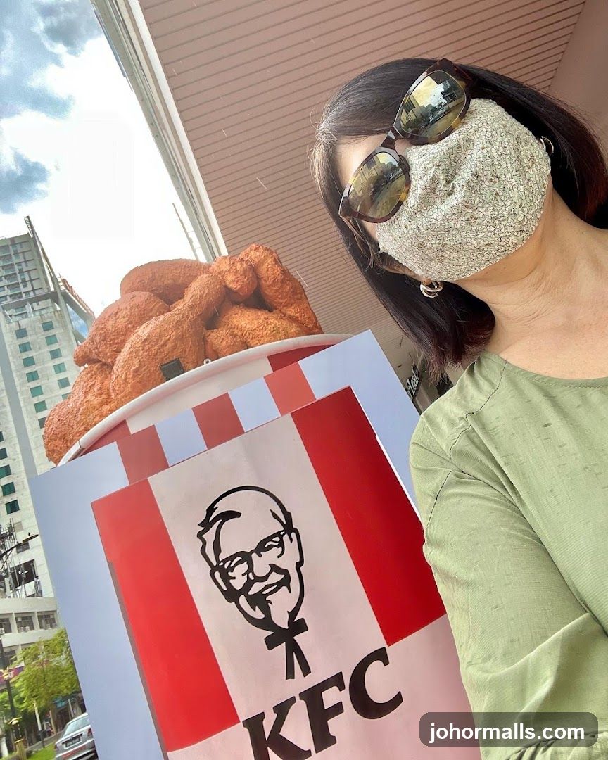 Woman Posing with KFC Bucket Display