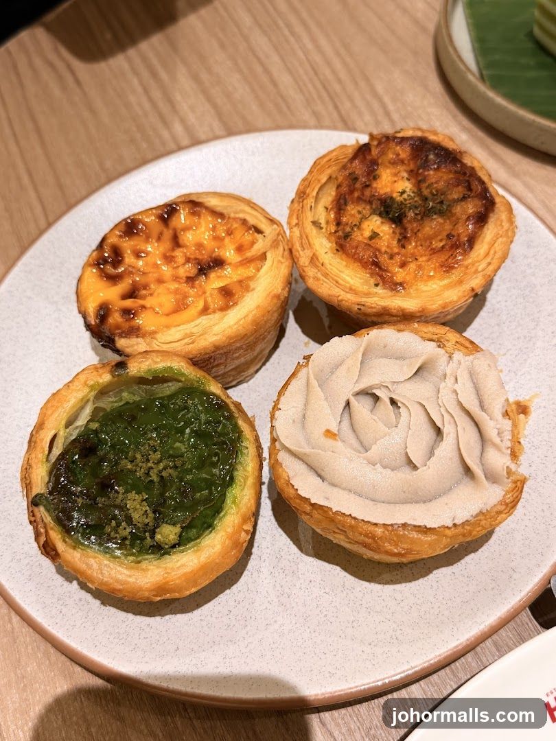 Four Pastries on a Plate
