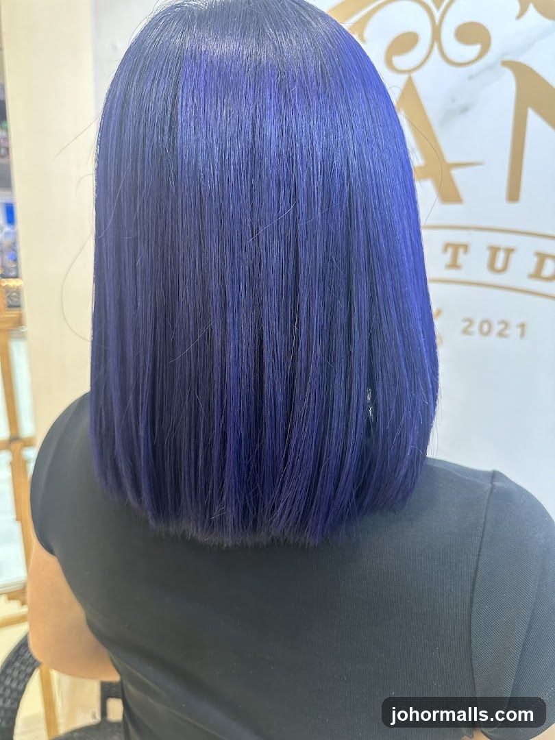 Woman with blue bob haircut