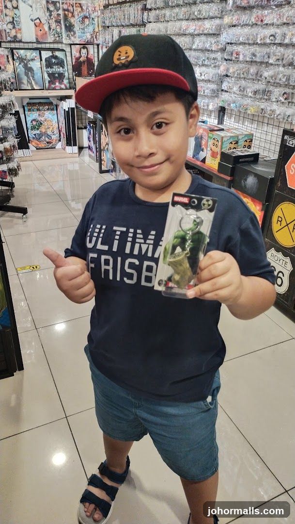 Child in store holding toy