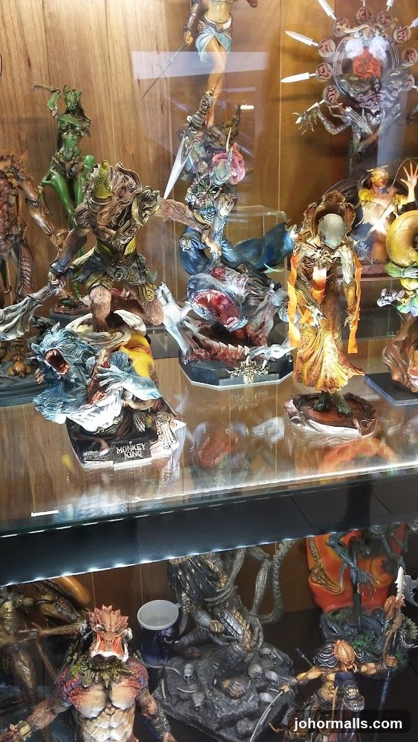 Display of figurines in glass case