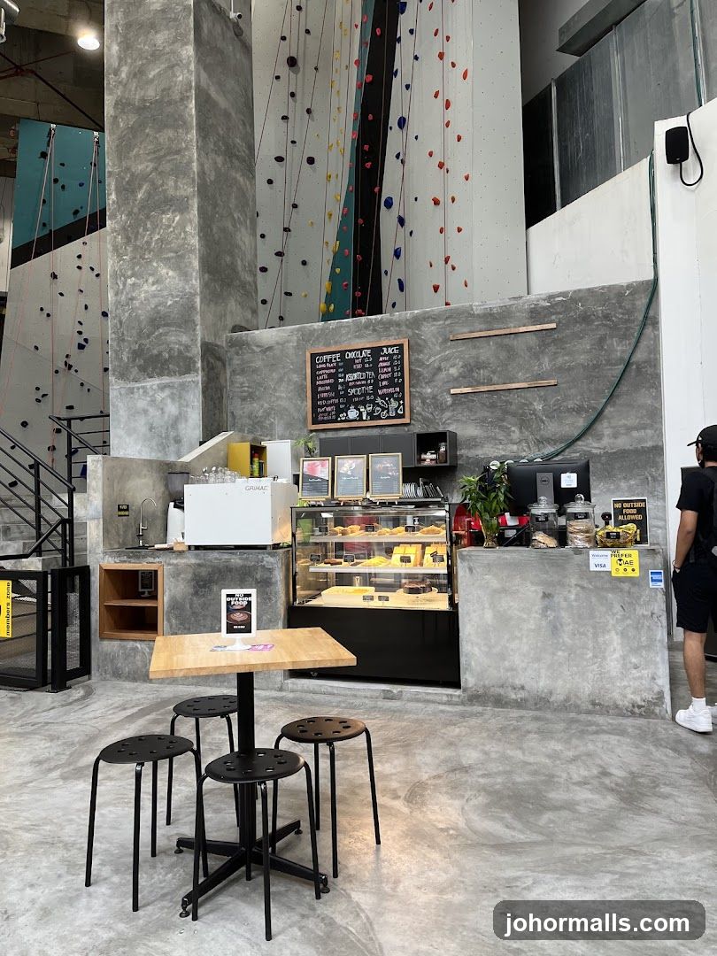 Indoor café area with climbing walls