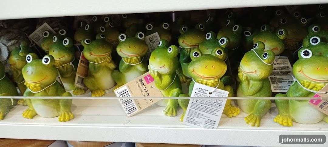 Frog figurines on store shelf