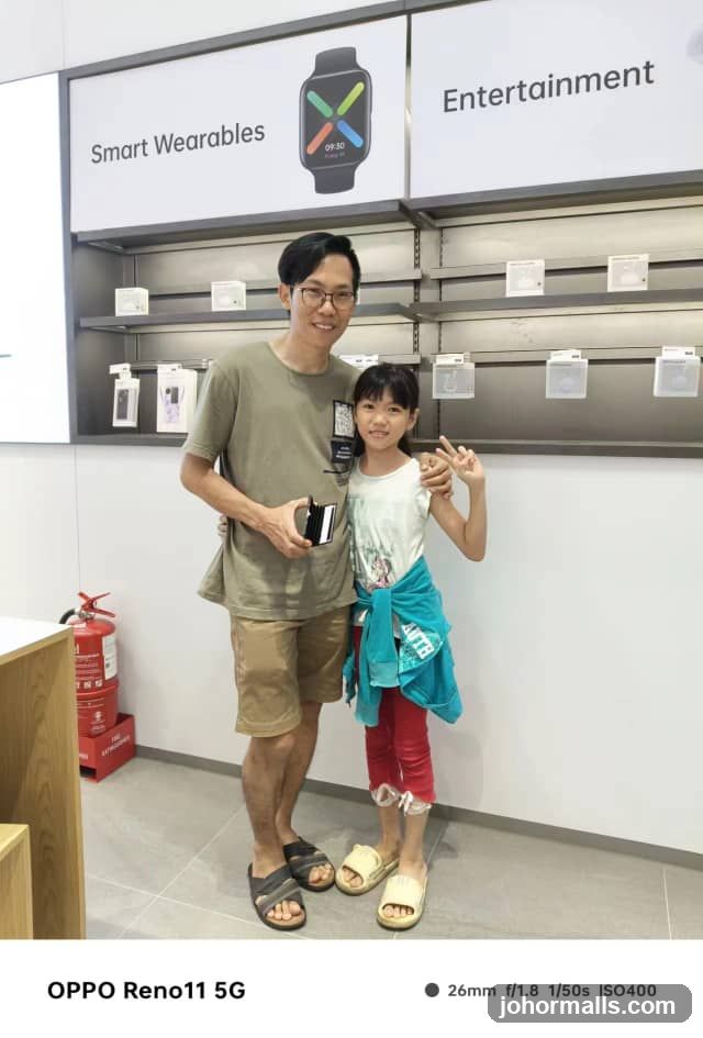Customer and child in electronics store