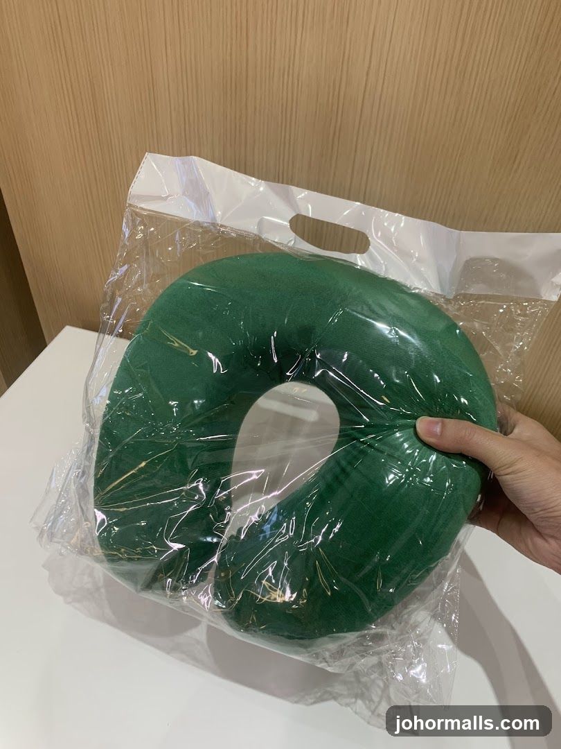 Green Neck Pillow in Packaging