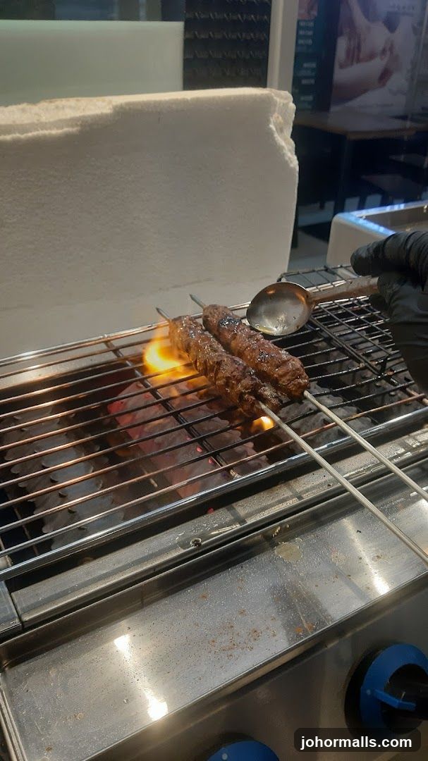 Grilled meat on barbecue