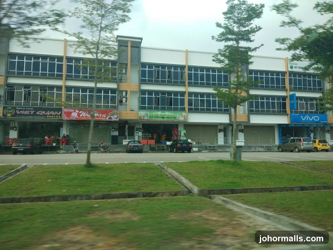 Commercial building facade with multiple shops