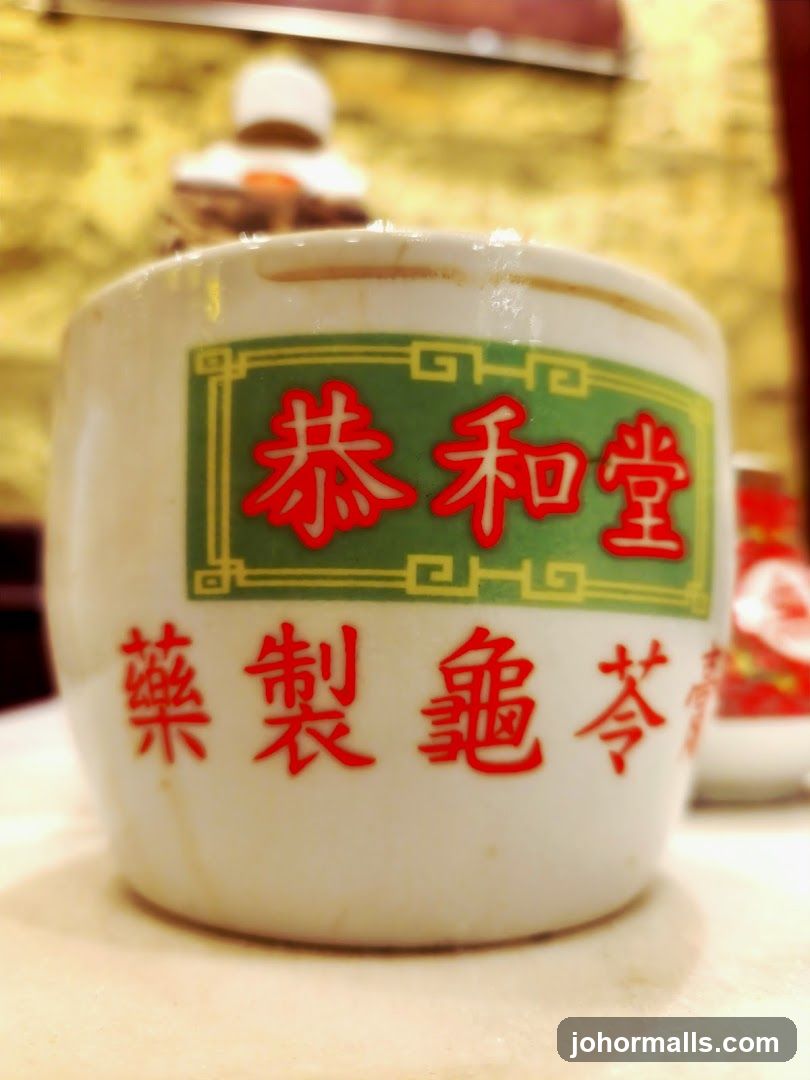 Close-up of a ceramic jar with Chinese characters