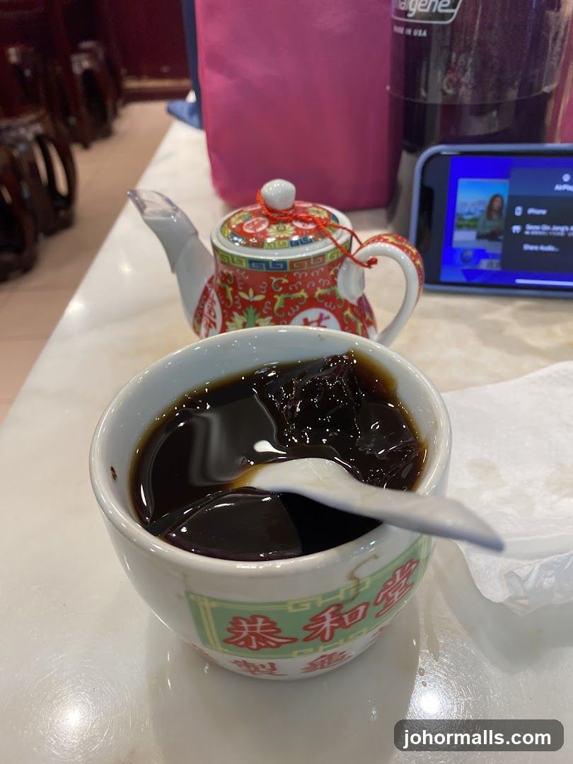 Tabletop with beverage and teapot
