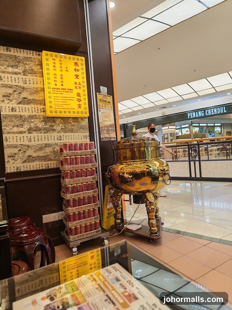 Interior of a shopping mall with a traditional Chinese tea shop