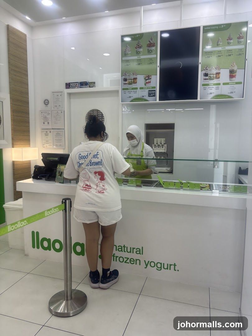 Customer at Frozen Yogurt Counter